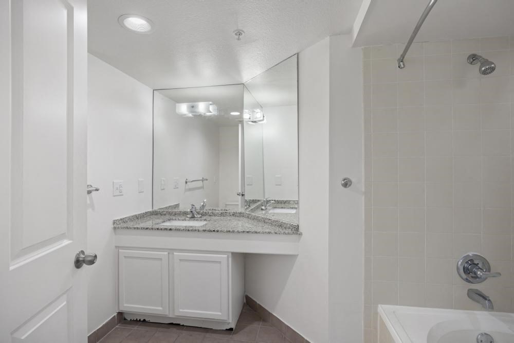 a bathroom with a sink and a bathtub
