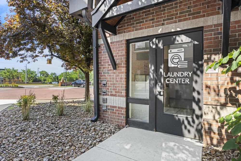 a building with a sign that says laundry center