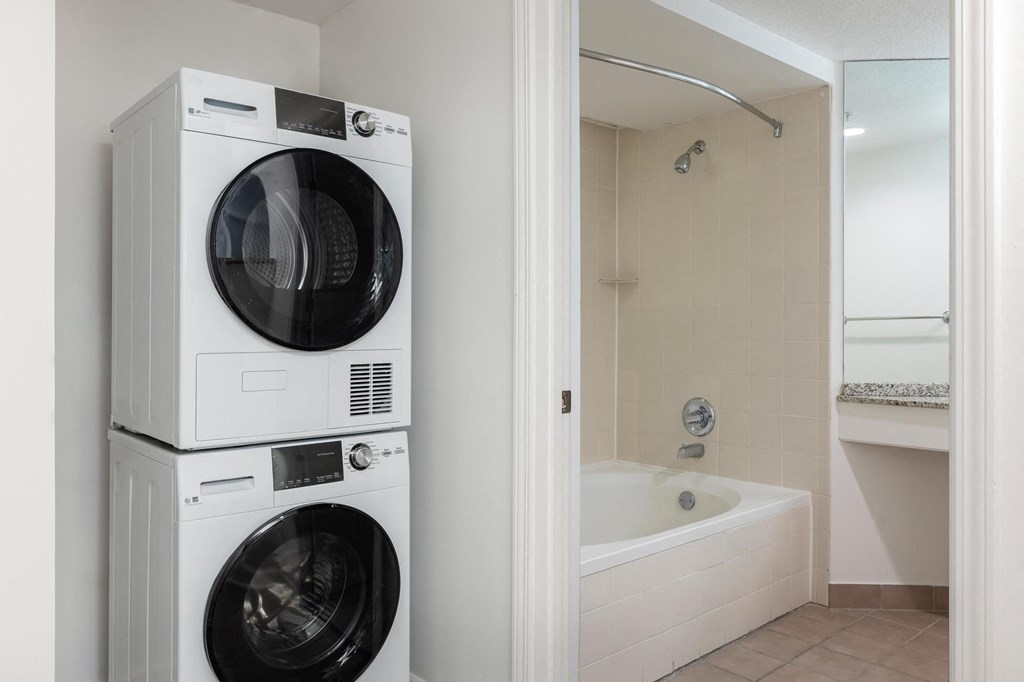 a washer and dryer in a bathroom