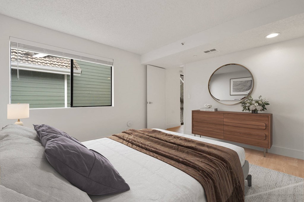 Bedroom With Mirror at AVIA Lofts on Parkway, Vancouver