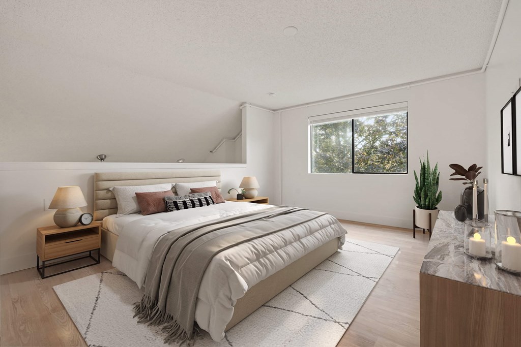 A well-lit bedroom at AVIA Lofts on Parkway, Vancouver, Washington