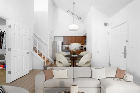 a living room with a couch and a table