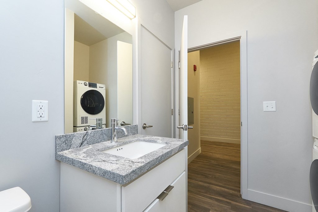 Laundry area at Brickside Heights Apartments, Millcreek, UT