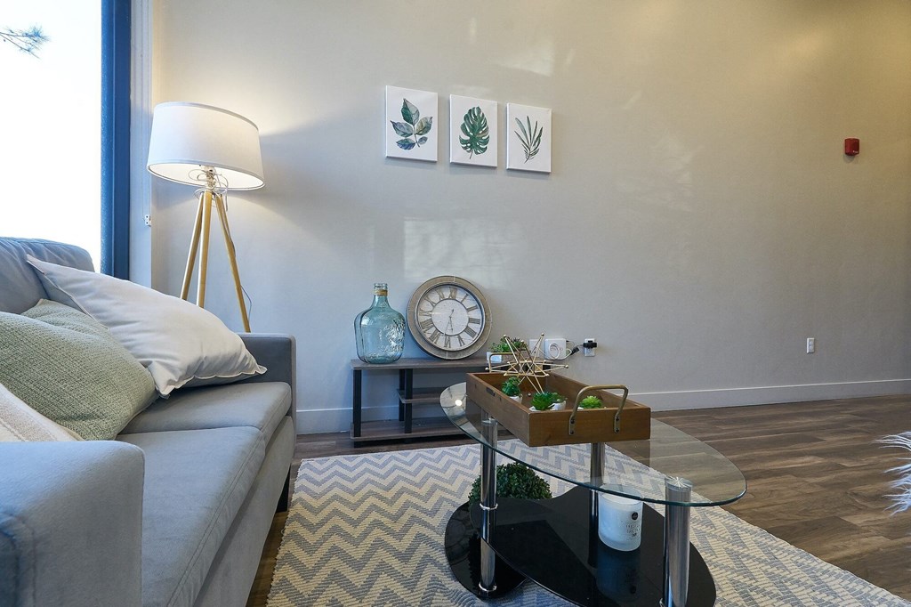 Living room with couch at Brickside Heights Apartments, Millcreek, UT, 84106