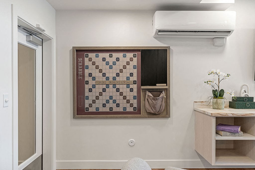 a chess board hanging on the wall in a bathroom at The Revival, Salt Lake City Utah