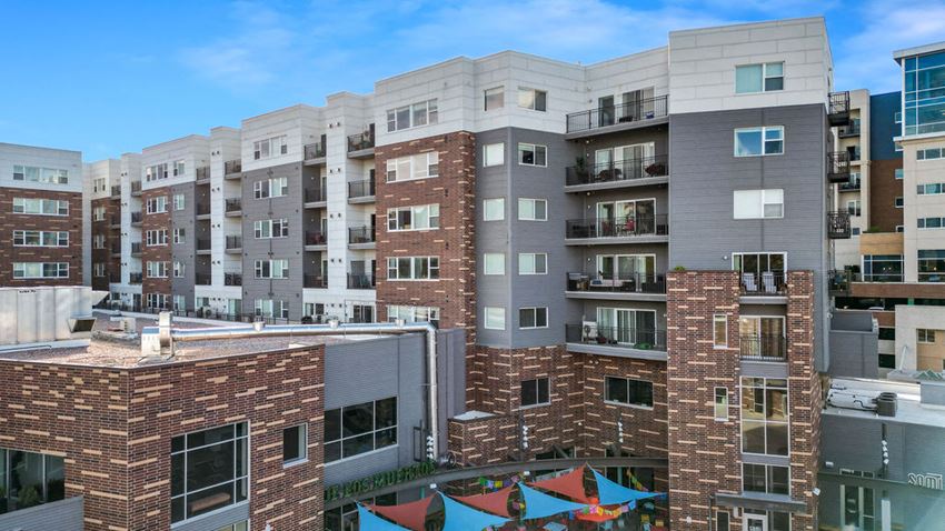 a view of an apartment complex from the roof of a building