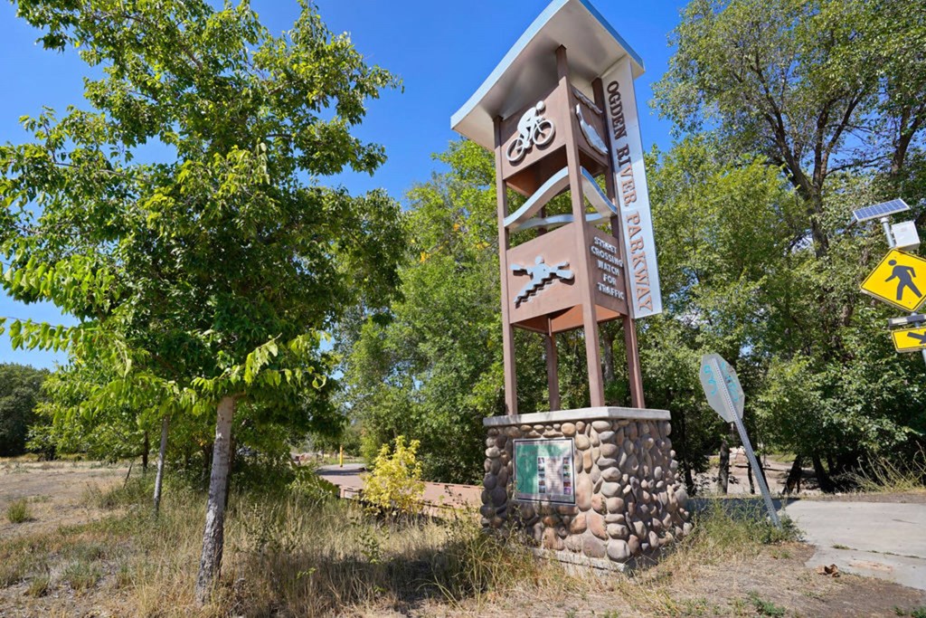 a water tower with a sign in front of it  at The View on 20th, Ogden