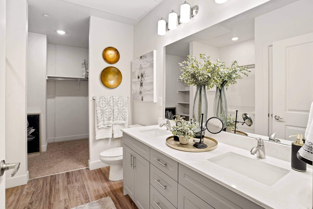 a white bathroom with a sink and a toilet  at 200 City View, Provo, UT, 84601