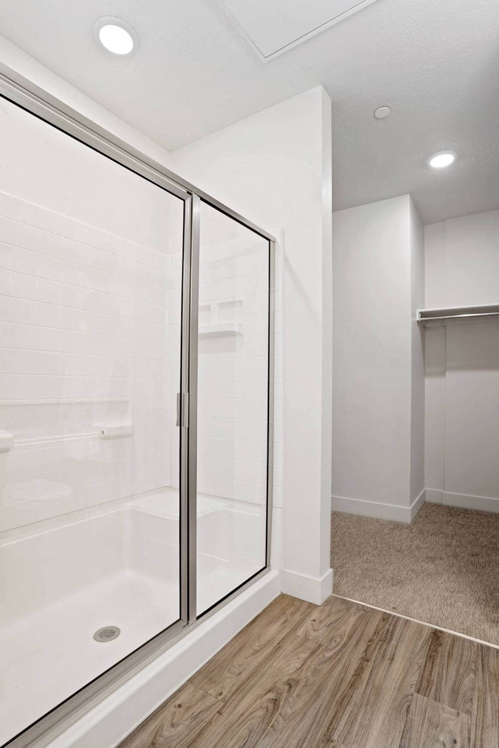 a walk in shower in a bathroom with a glass door at 200 City View, Provo, 84601