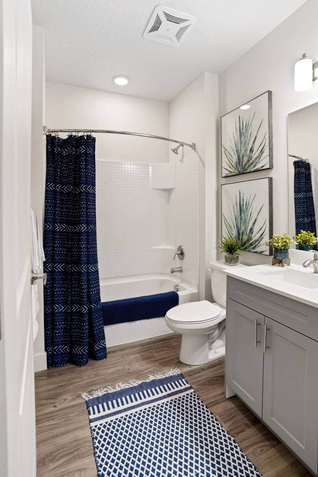 a bathroom with a shower and a toilet and a sink at 200 City View, Provo, UT