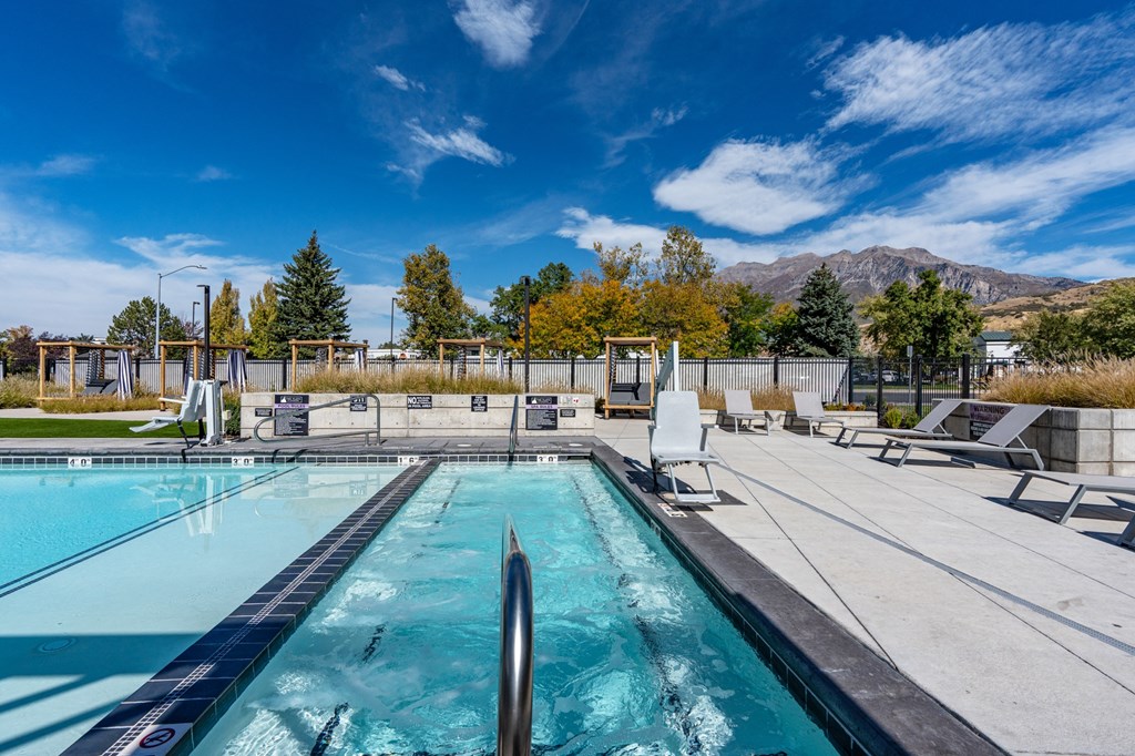 the pool at the residence on lamar apartment homes at The Flats at Riverwoods, Provo, UT