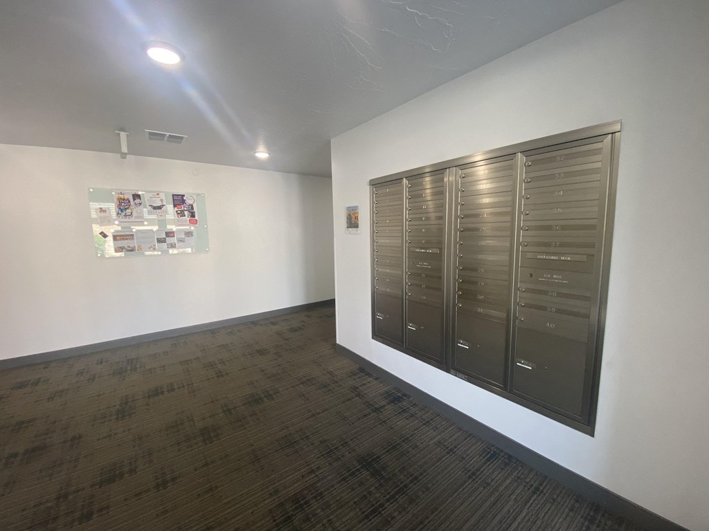 a room with lockers and a poster on the wall
