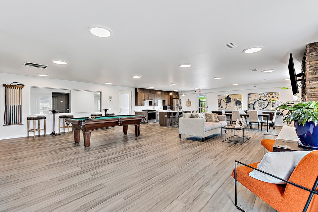 our apartments have an open floor plan with a games room