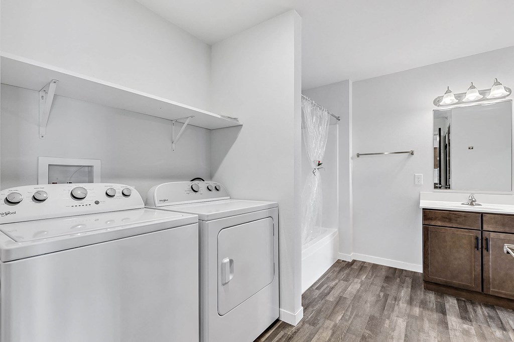 A laundry room with a washer and dryer.
