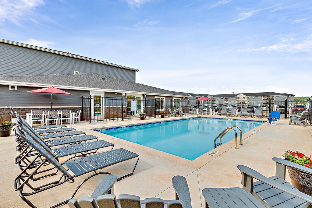 take a dip in our resort style pool at Red Rock Apartments, Rapid City, SD, 57702