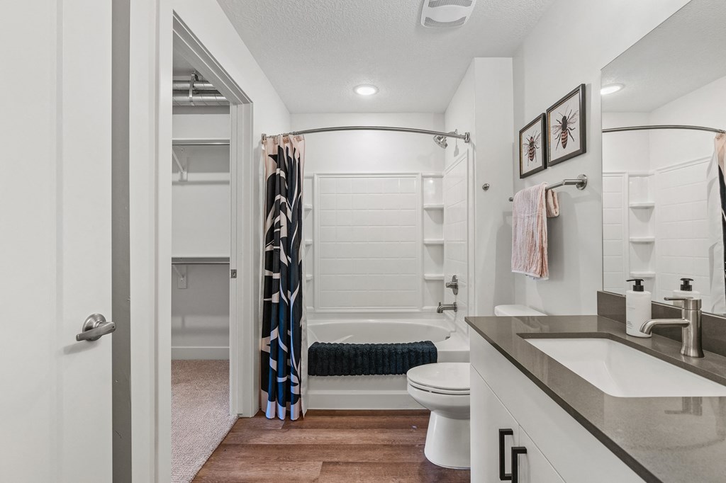 a bathroom with a shower and a toilet and a sink at The Revival, Salt Lake City, 84101