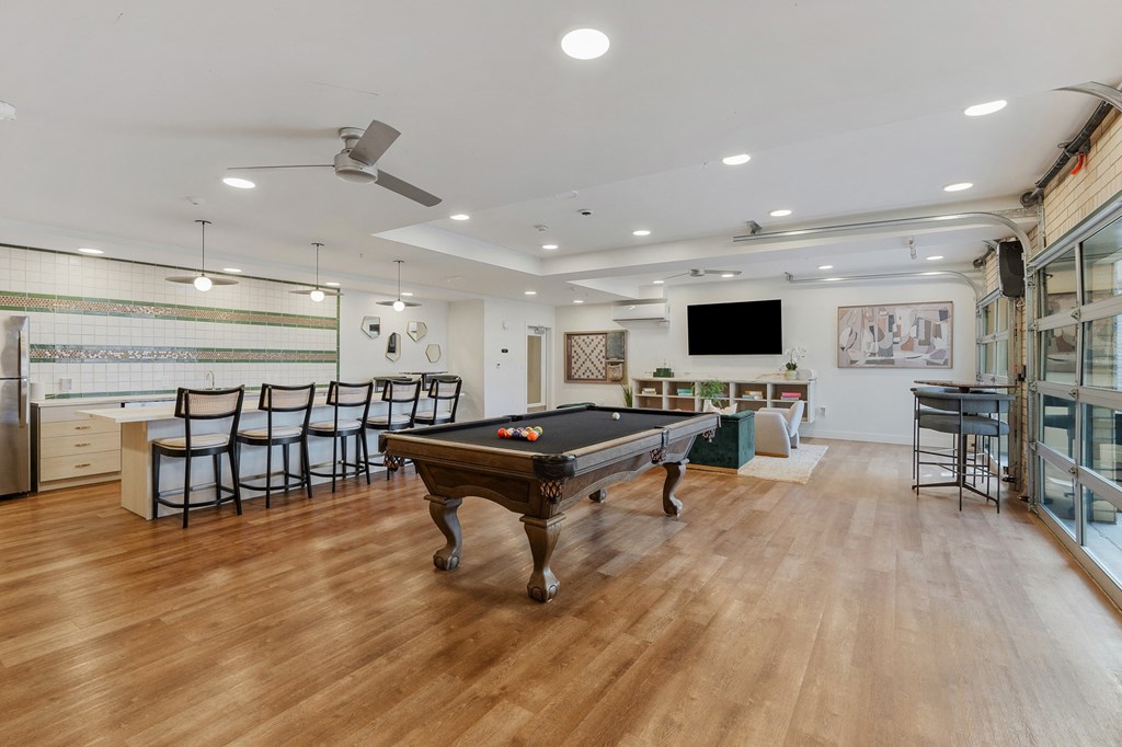 a game room with a pool table and a bar at The Revival, Salt Lake City