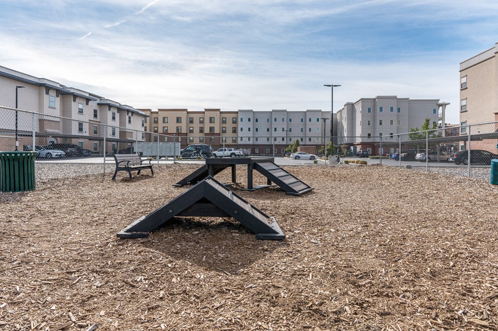 a playground with a ramp and a picnic table in a parkat The View on 20th, Ogden, UT, 84401