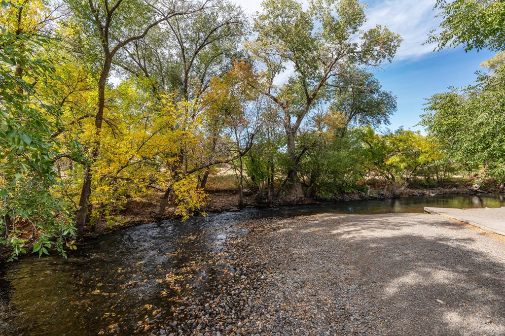 a river running through a park with treesat The View on 20th, Ogden, Utah