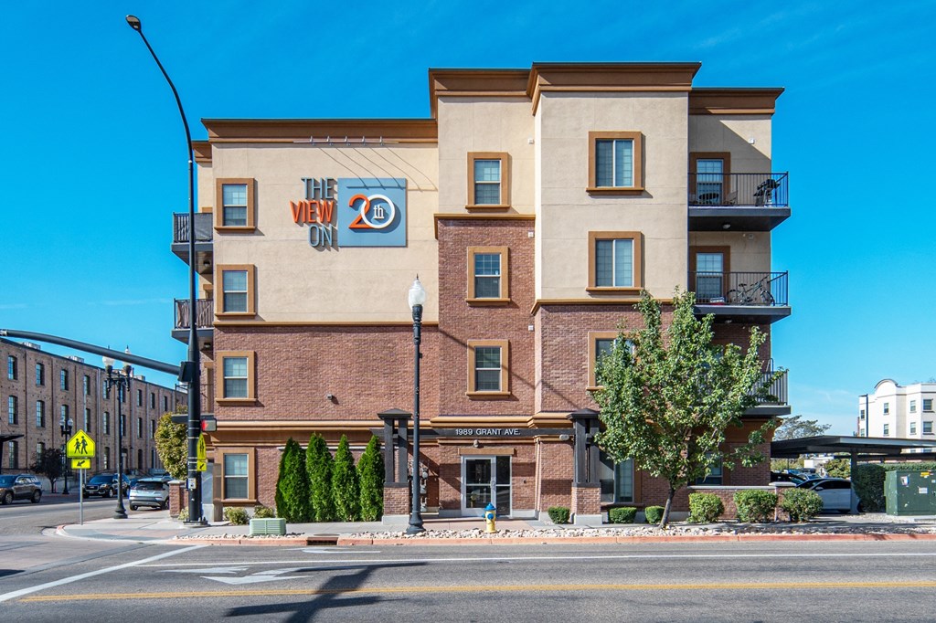 the new yorker apartment building on the corner of a streetat The View on 20th, Ogden, UT