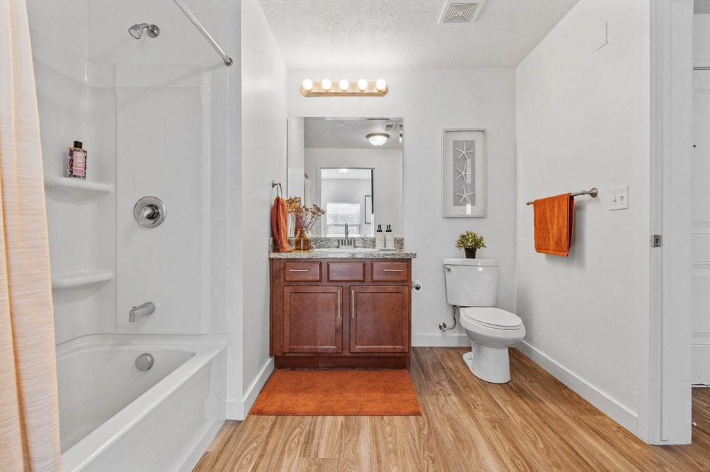 a bathroom with a shower toilet and sink and a bath tubat The View on 20th, Utah