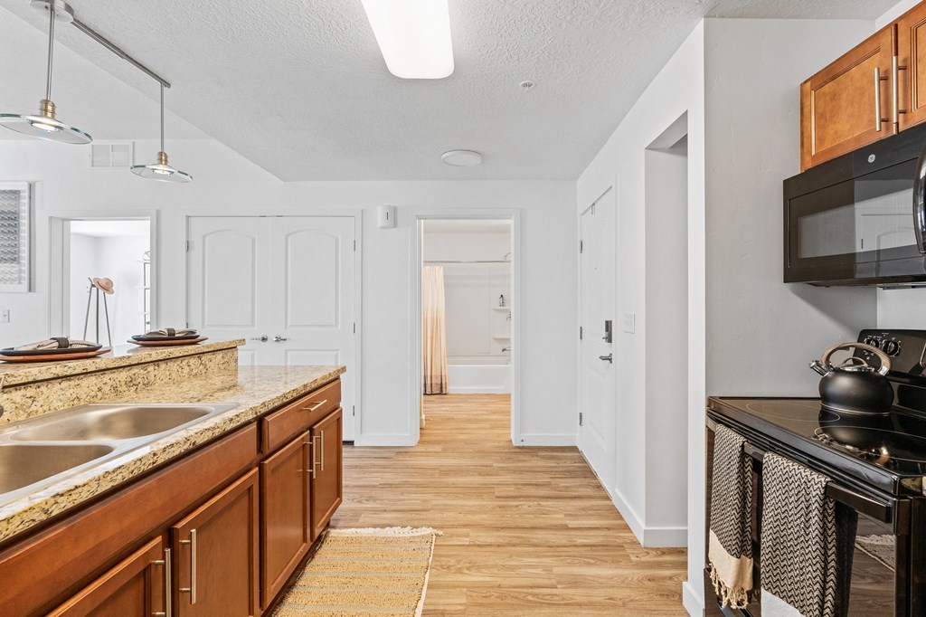 a kitchen with a sink and a counter top and a microwaveat The View on 20th, Ogden, Utah