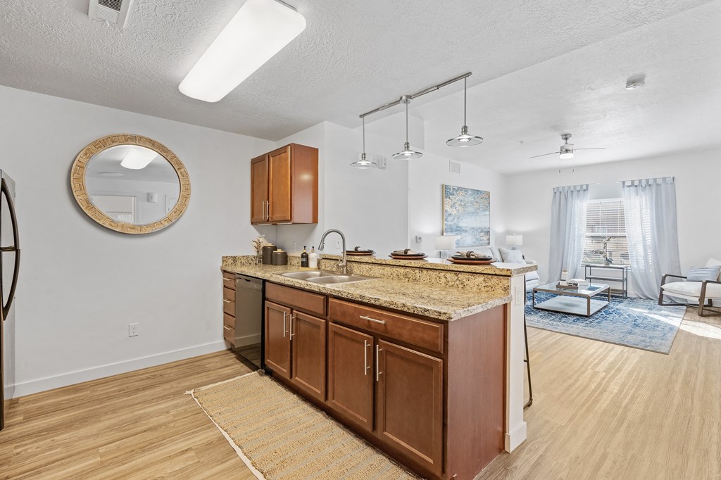 the view of a living room and a kitchen with a counter topat The View on 20th, Ogden, UT, 84401