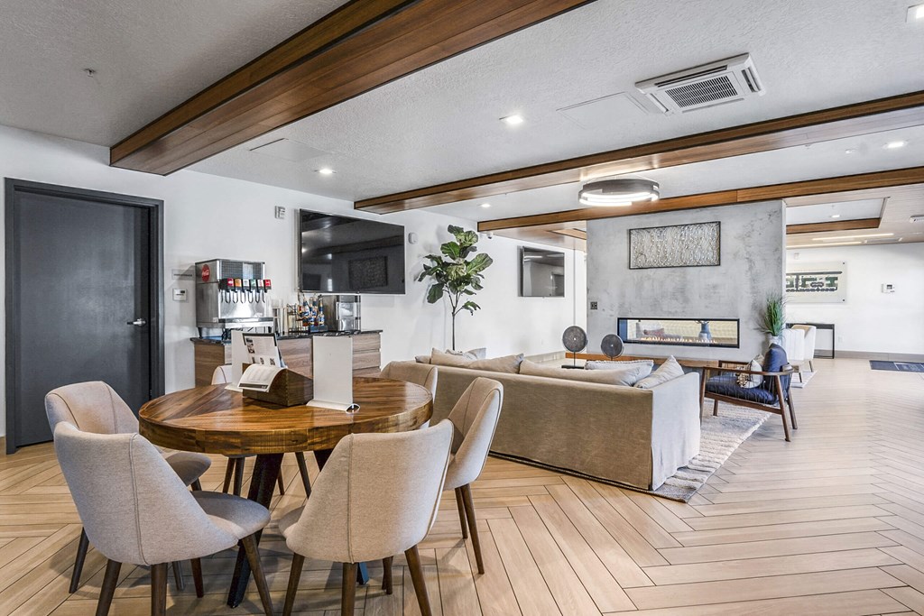 a view of the living room and kitchen from the dining area at The Flats at Riverwoods, Provo
