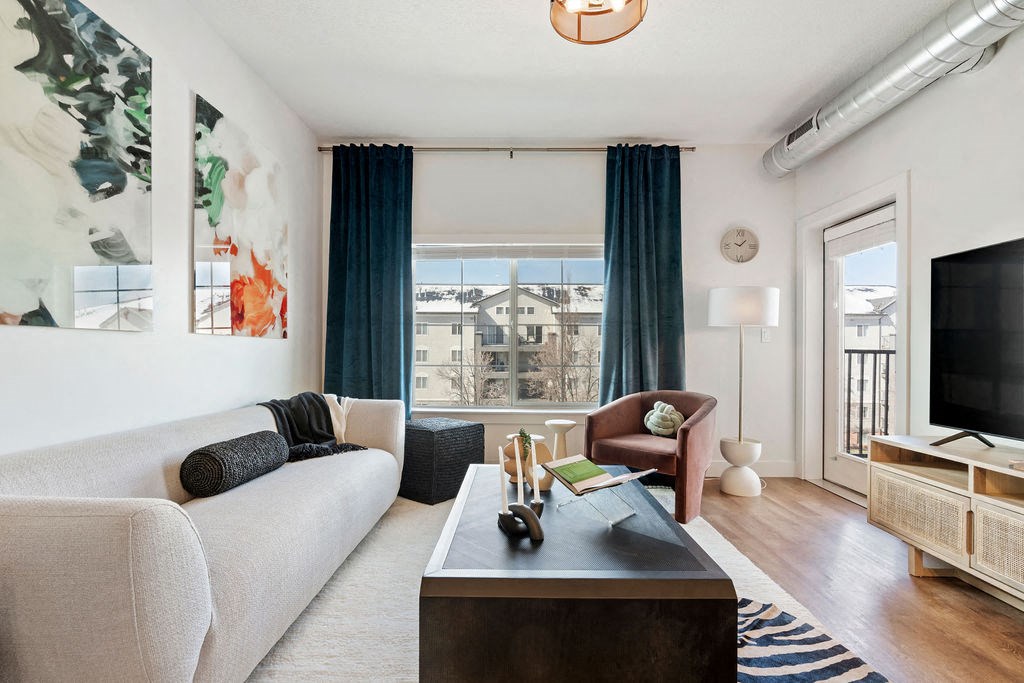 a living room with a couch and a coffee table at The Revival, Salt Lake City