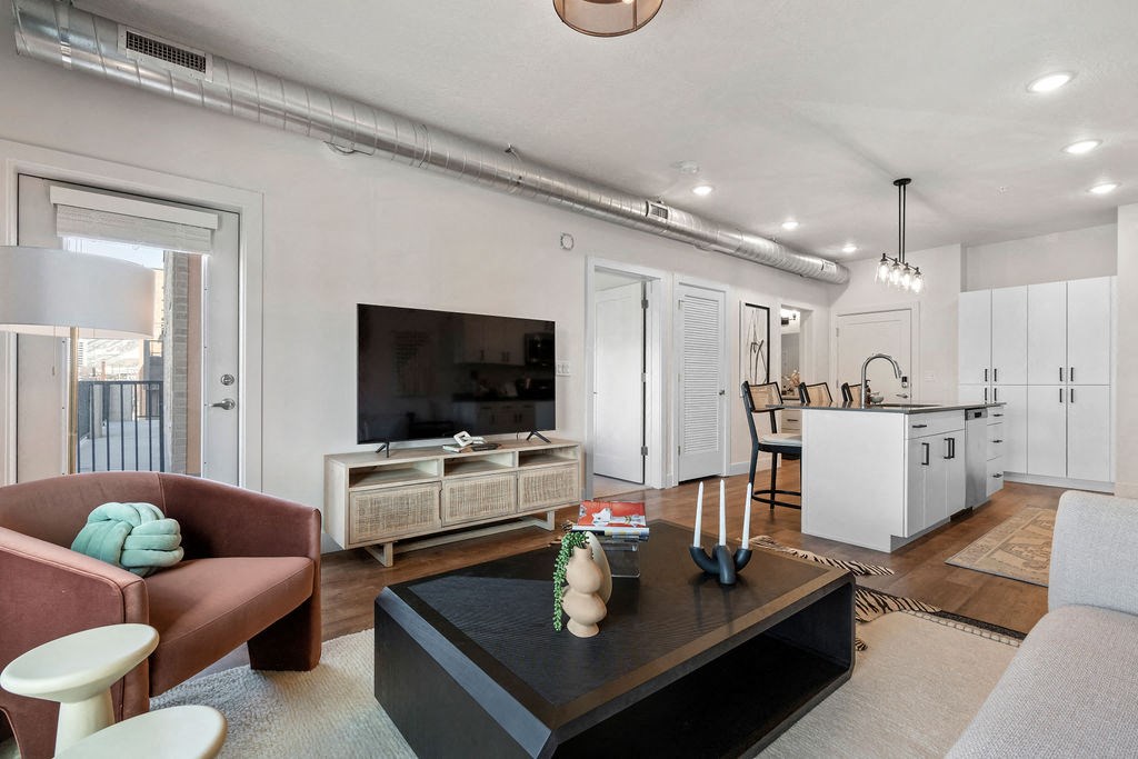 a living room with a couch and a table at The Revival, Salt Lake City, UT