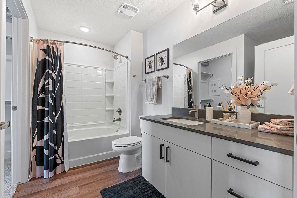 a bathroom with a shower and a sink and a toilet at The Revival, Utah