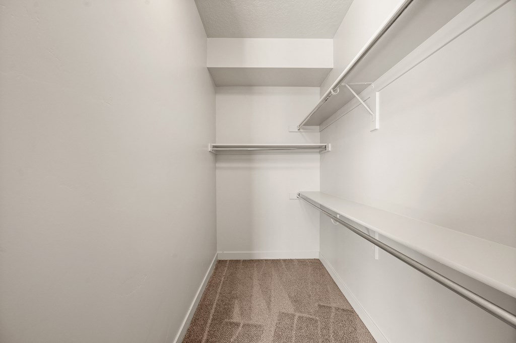 a spacious walk in closet at the casey, 2100 delgany, co