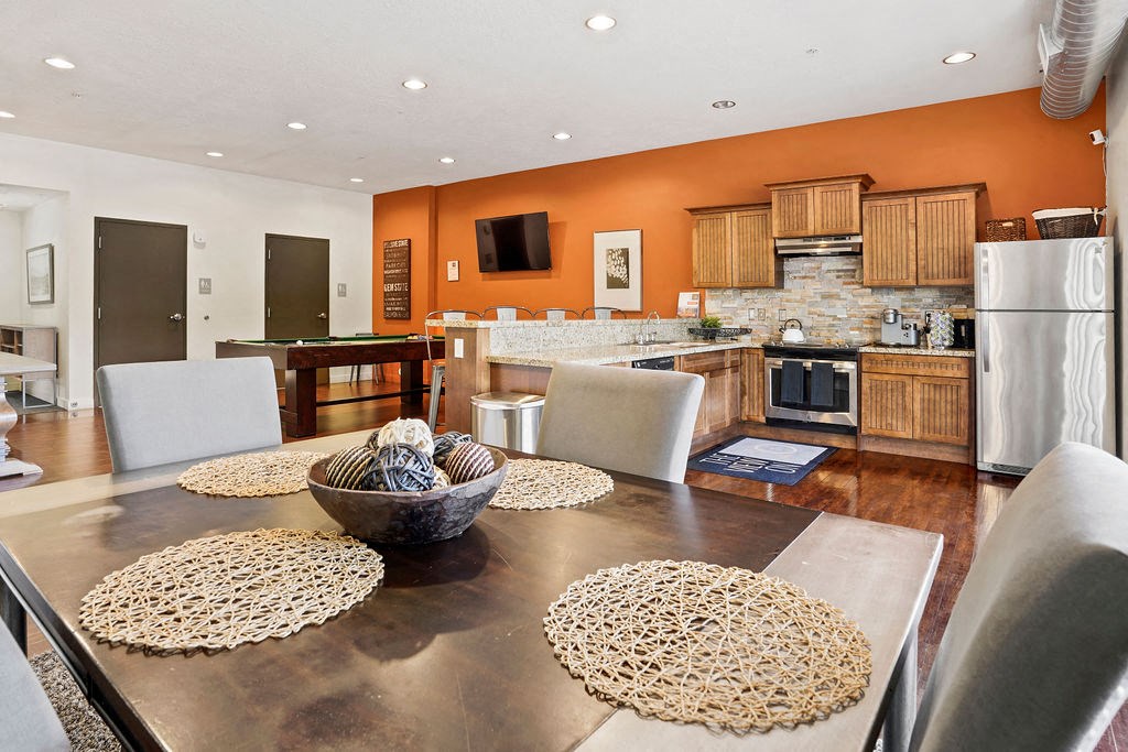 a kitchen and dining room with a table and chairs at The View on 20th, Ogden, UT