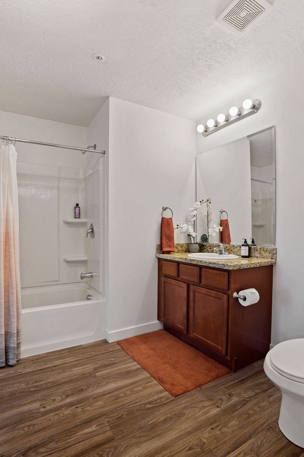 a bathroom with a sink toilet and shower at The View on 20th, Ogden, UT