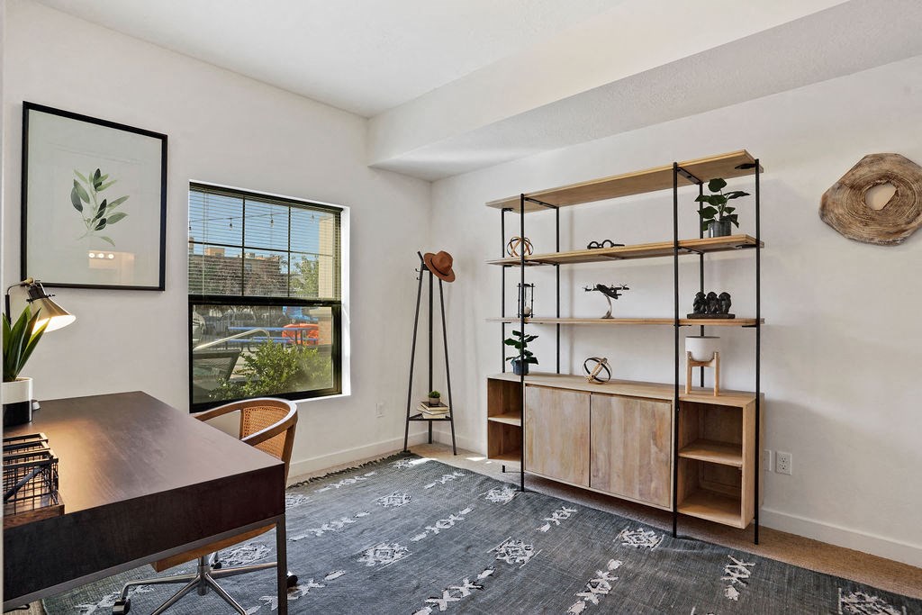a room with a desk and a window at The View on 20th, Ogden
