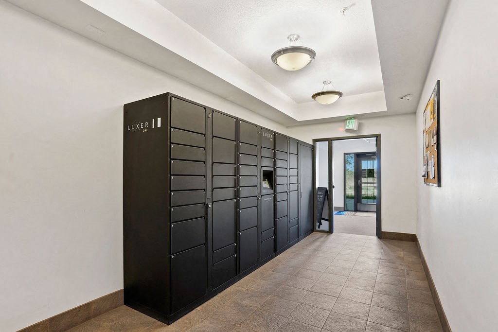 a row of lockers in a hallway of a building at The View on 20th, Ogden, UT