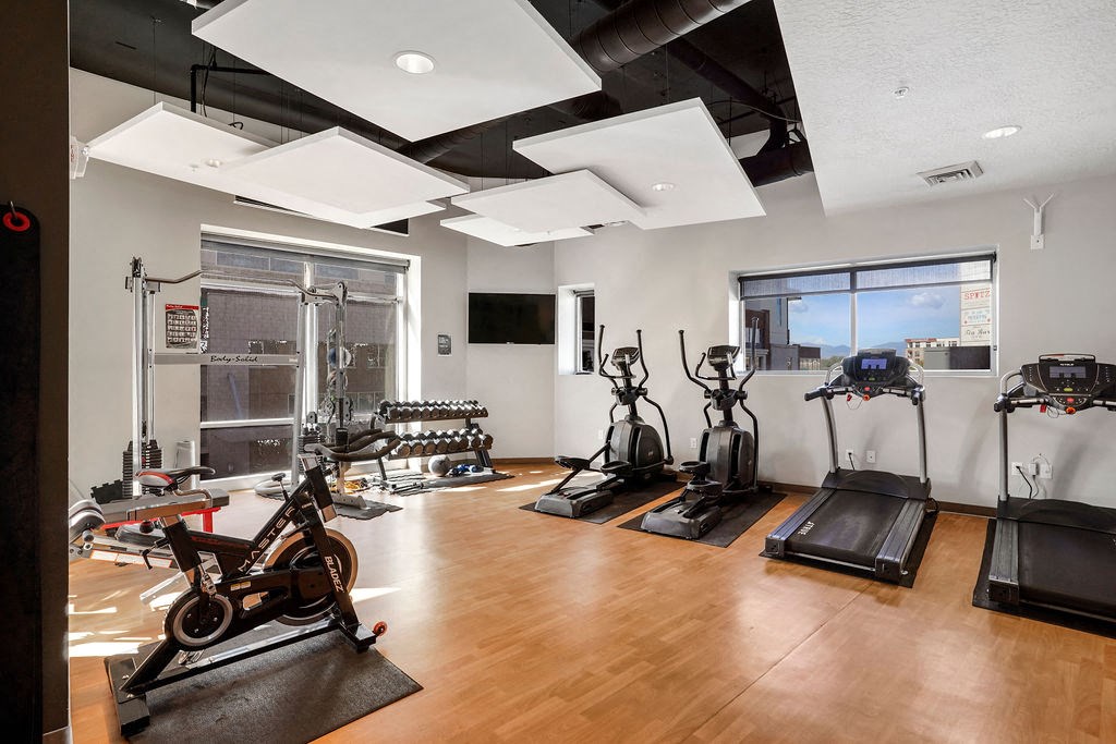a workout room with treadmills and other exercise equipment at Wilmington Flats Apartments, Salt Lake City, UT