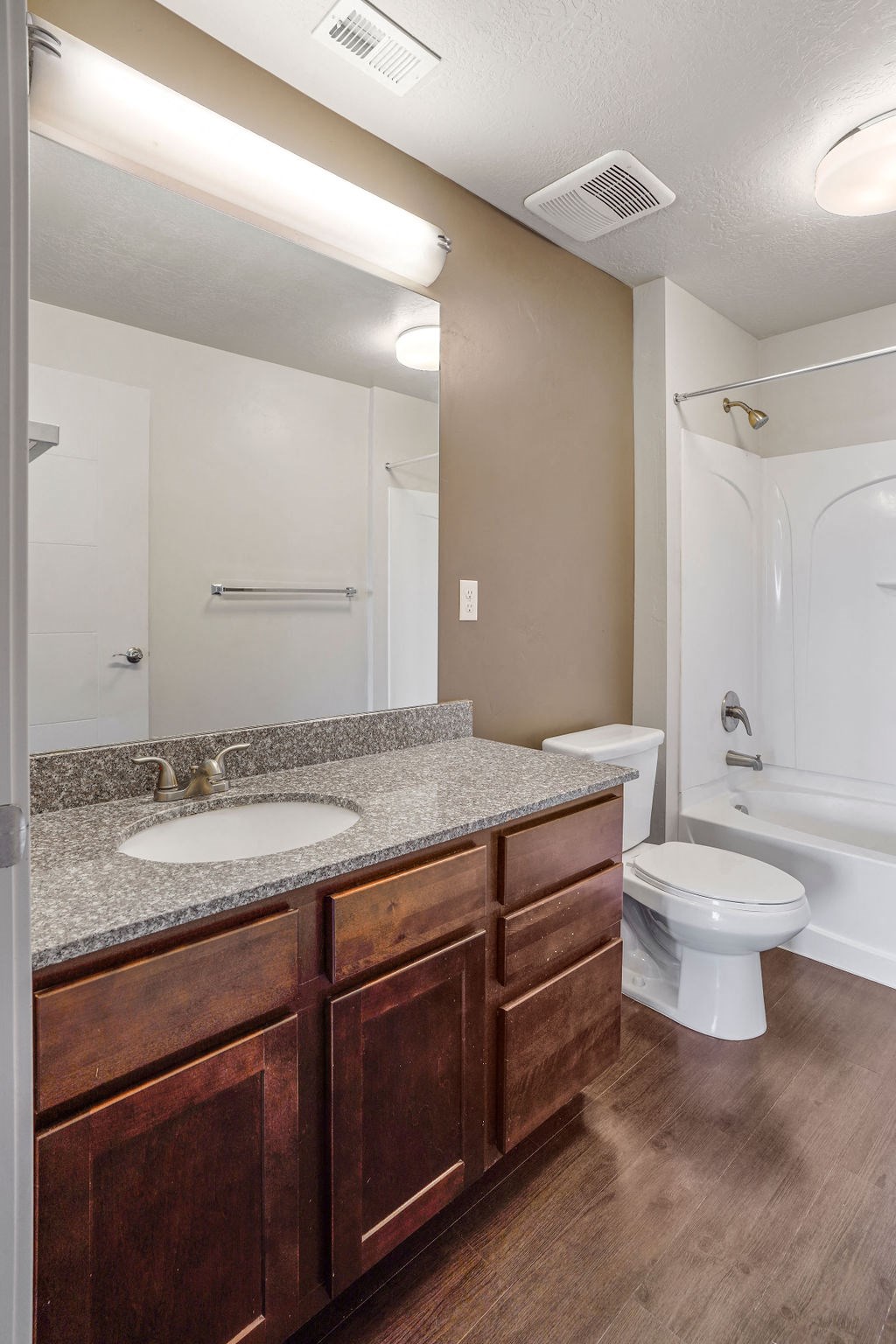 a bathroom with a sink toilet and bathtub at Wilmington Flats Apartments, Utah