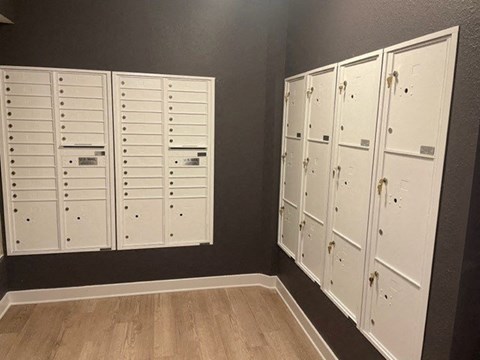 a row of white lockers in a room