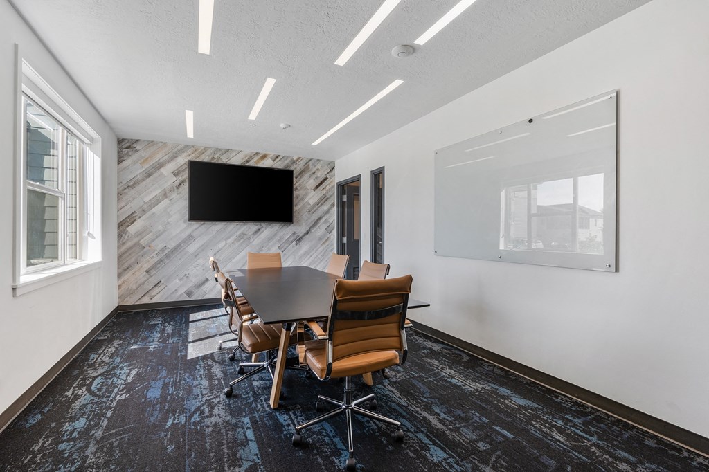 conference room with table and chairs at The Flats at Riverwoods, Provo, Utah