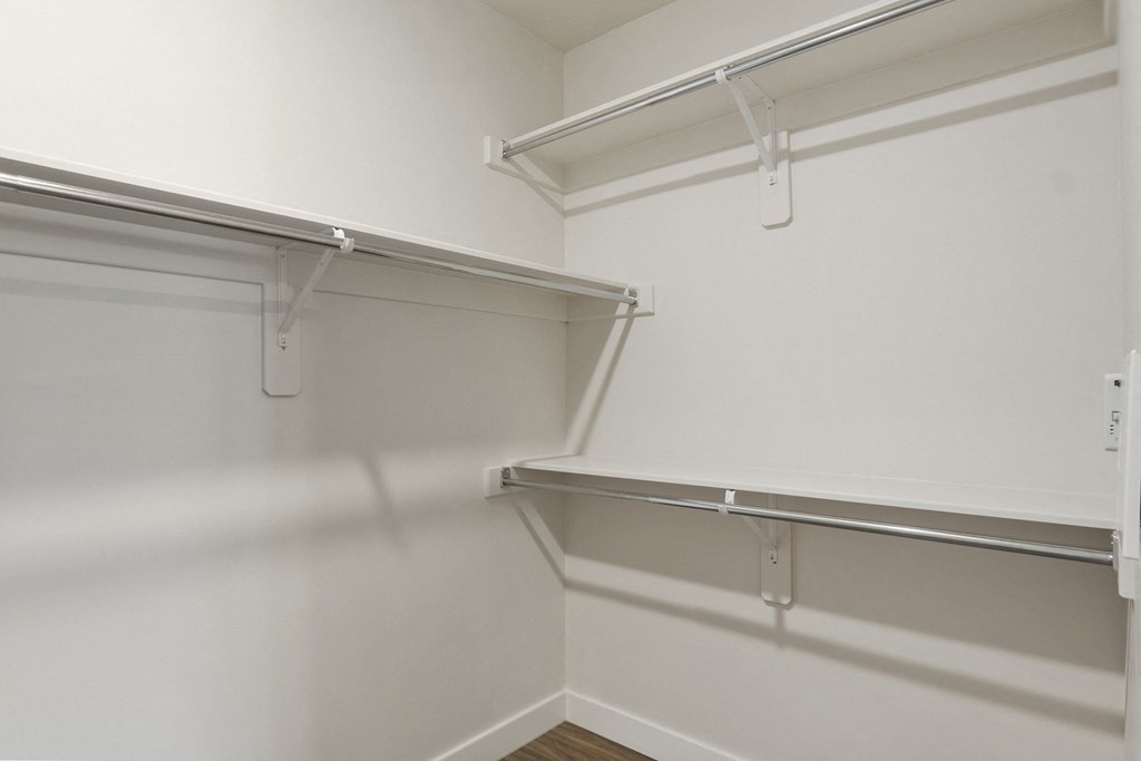 a spacious walk in closet in a 555 waverly unit at The Flats at Riverwoods, Utah