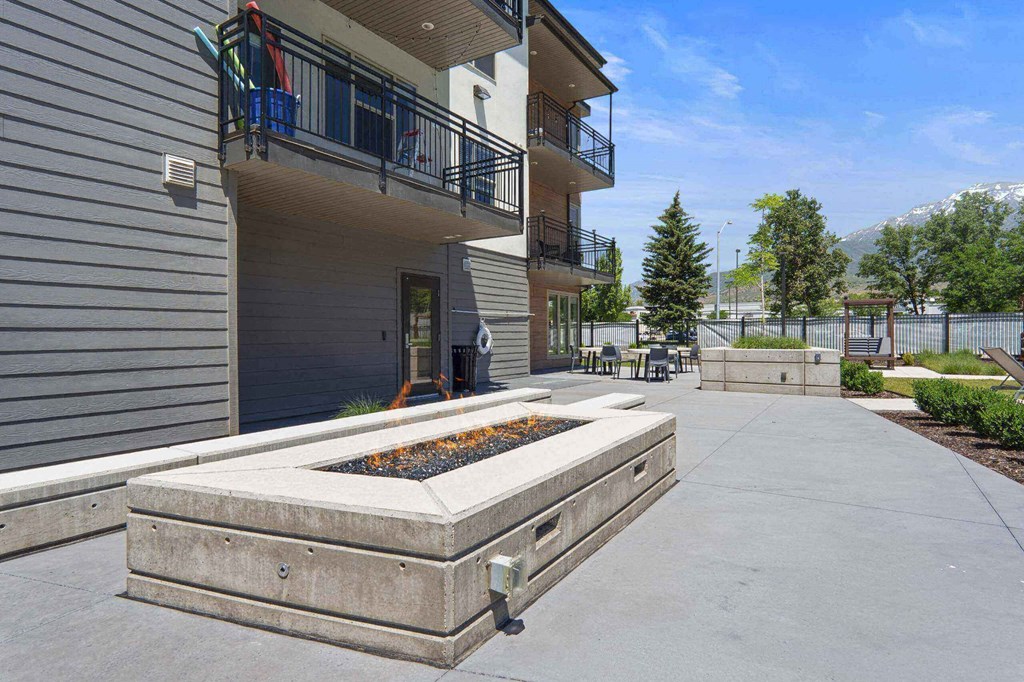 the courtyard at the whispering winds apartments in pearland, tx at The Flats at Riverwoods, Utah
