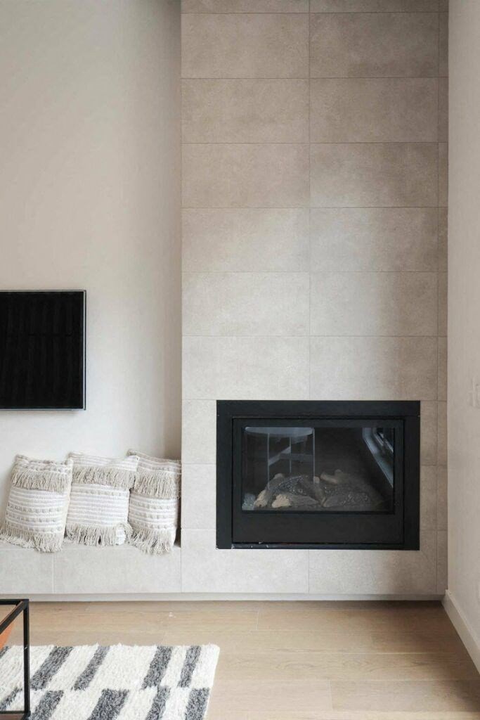 a minimalist living room with a fireplace and a tv on the wall