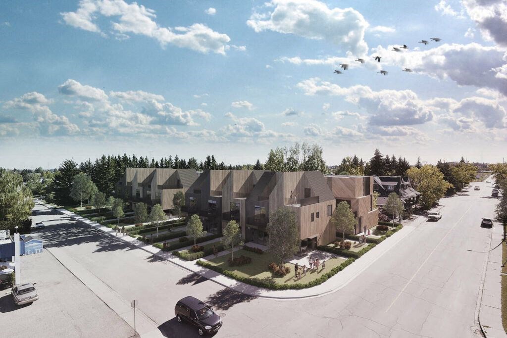 an aerial view of a neighborhood of houses with cars parked in front of them