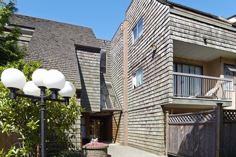 a house with a gray shingle roof