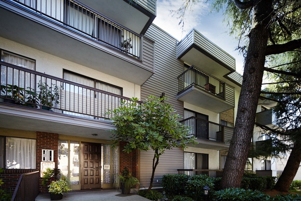 a rendering of the exterior of a building with balconies