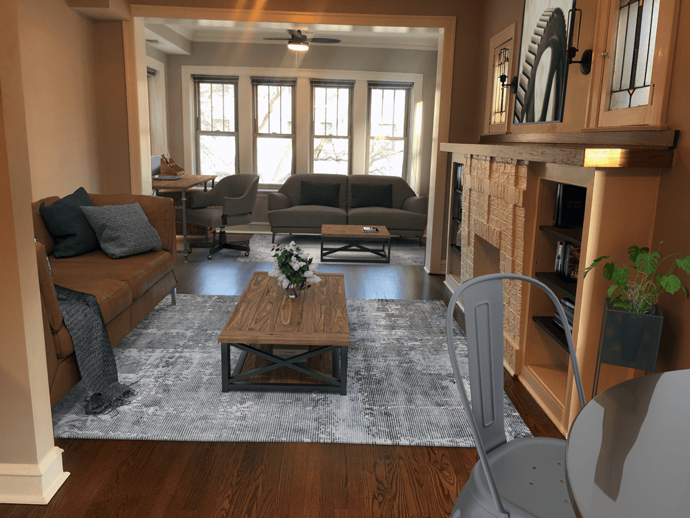 a living room with couches and a coffee table