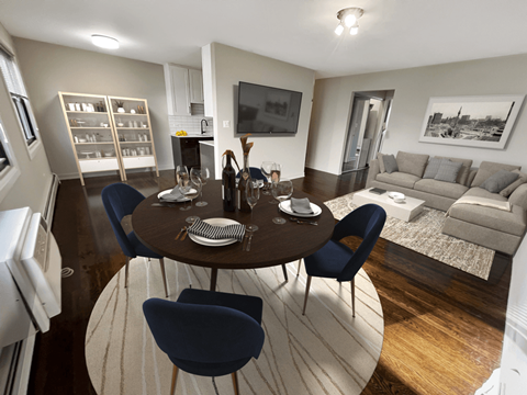 a living room and dining room with a table and chairs