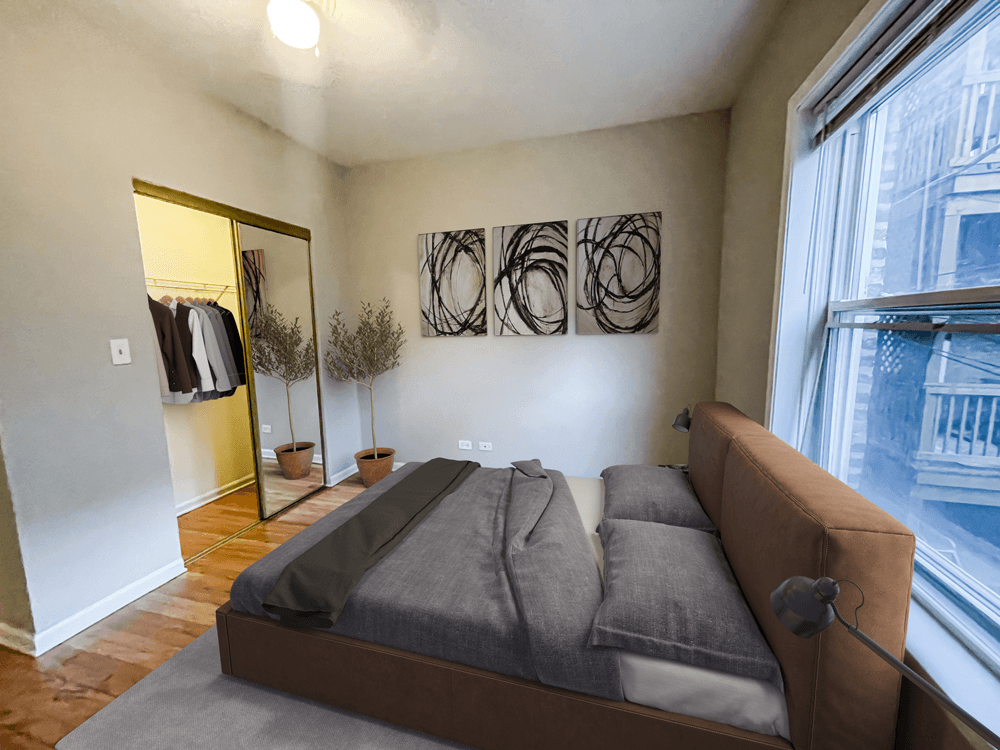 Barry Court Apartments bedroom with a Queen bed and a large window