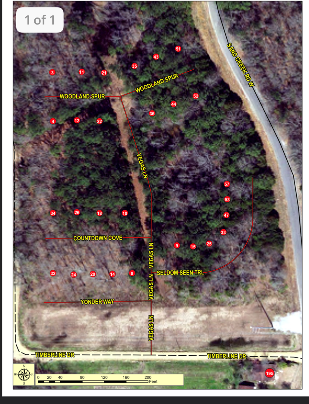 a map of the area with red dots and trees